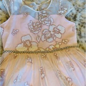 Size 12 Formal girl’s dress. Light pink with glitter. Dry cleaned once.Beautiful
